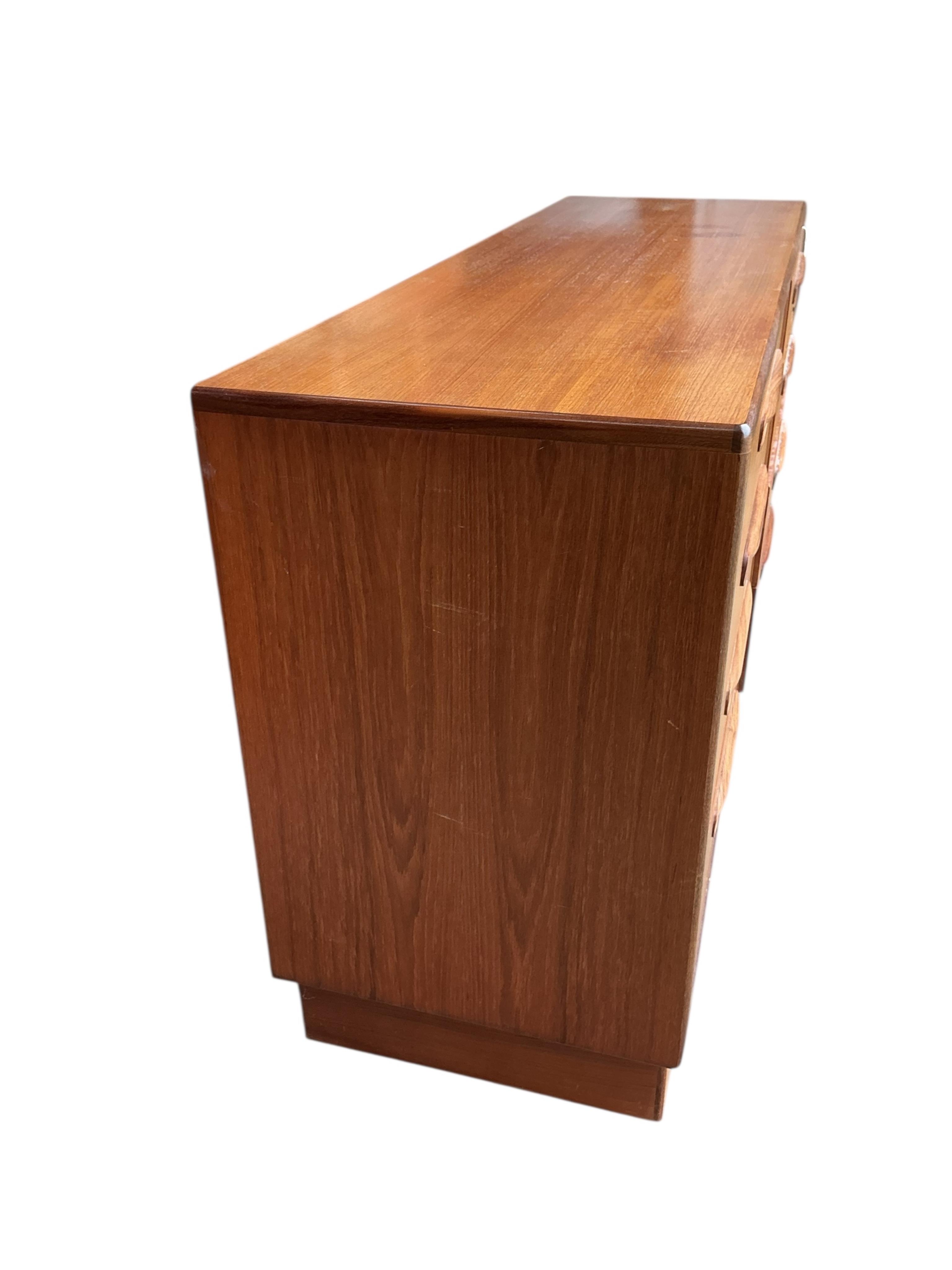 A mid century G Plan Fresco teak eight drawer chest, width 142cm, depth 44cm, height 76cm